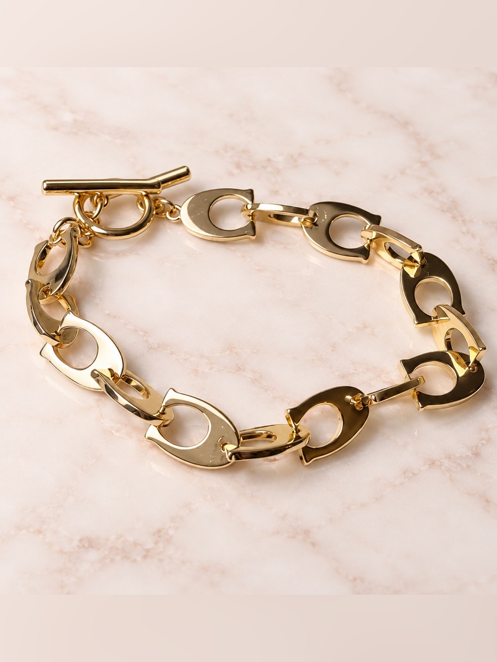 Coach Women's Gold Link Bracelet with Signature Hardware